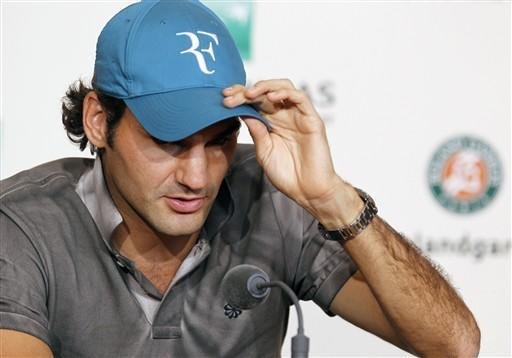 Federer estreia na grama com vit&oacute;ria sobre Nieminen