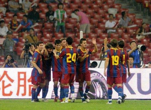 Barcelona fecha giro asi&aacute;tico com goleada de 3-0 no Beijing Guoan