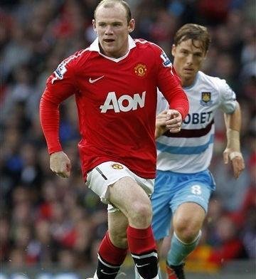 Rooney surpreende e assina novo contrato com o Manchester United