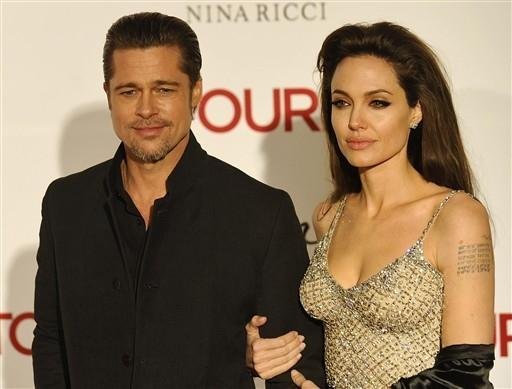Angelina Jolie e Brad Pitt v&atilde;o casar em 2011