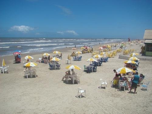 Veranistas aproveitam a praia em Tramanda&iacute;