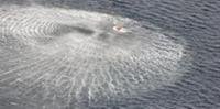Helicópteros derramam água para resfriar reatores da usina de Fukushima
