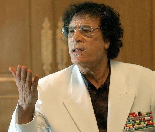 Kadhafi diz que n&atilde;o ser&aacute; pego por bombardeios pois &acute;est&aacute; nos cora&ccedil;&otilde;es` dos l&iacute;bios