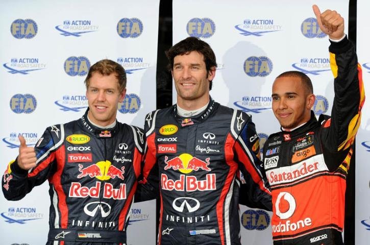 Lewis Hamilto e Sebastian Vettel largam logo atr&aacute;s de Mark Webbe