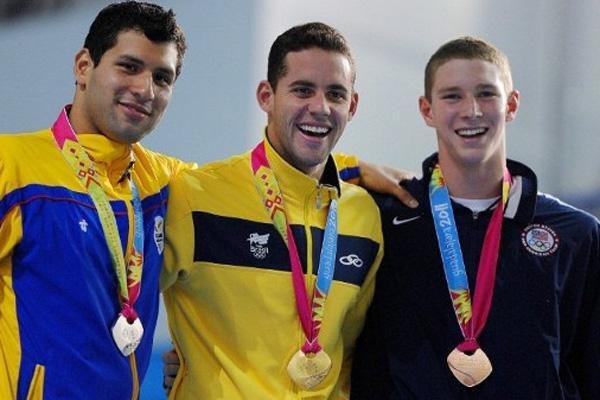 Recordista de vit&oacute;rias no Pan, Thiago Pereira (C) quer medalha ol&iacute;mpica
