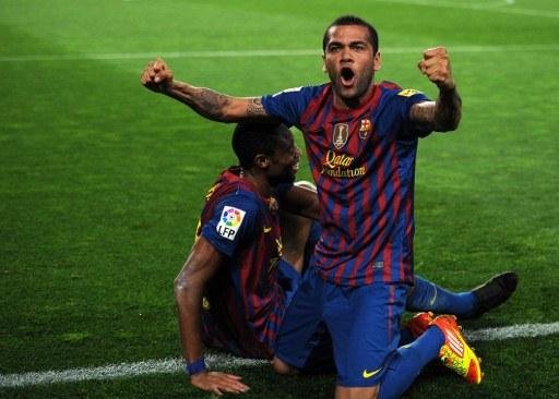 Brasileiro Daniel Alves comemora vit&oacute;ria