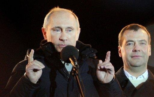 Putin obteve 64,39% dos votos, contabilizados os votos de 50% das se&ccedil;&otilde;es eleitorais