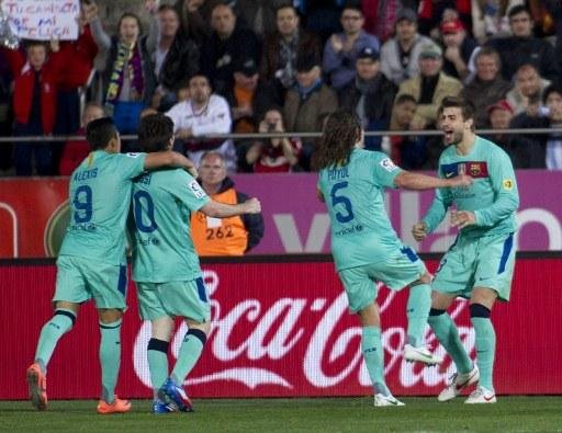 Bar&ccedil;a vence e aumenta press&atilde;o sobre Real no Espanhol