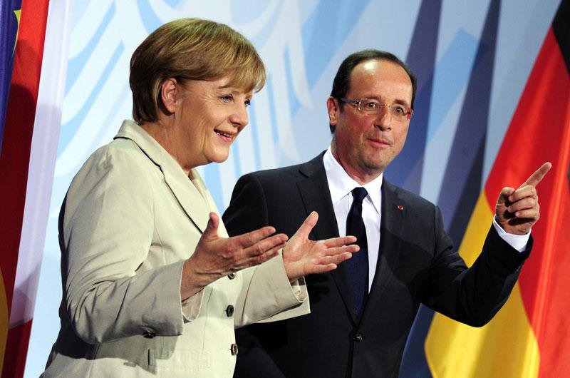 Merkel e Hollande defendem perman&ecirc;ncia de Gr&eacute;cia na Eurozona