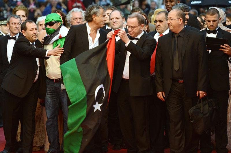 Ex-rebeldes l&iacute;bios e insurgentes s&iacute;rios aparecem no tapete vermelho de Cannes
