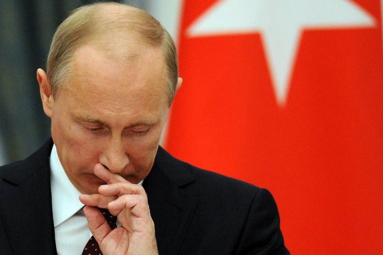 Putin assinou entrada da R&uacute;ssia na OMC, mas sofre cr&iacute;ticas dos comunistas