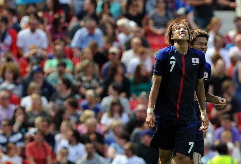 Jogador japon&ecirc;s Otsu comemora vit&oacute;ria de 3 a 0 do time sobre o Egito na Olimp&iacute;ada
