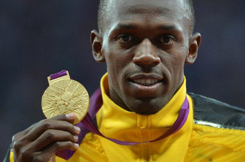 Bolt &eacute; bicampe&atilde;o e recordista ol&iacute;mpico dos 100m rasos
