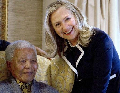 "&Eacute; um belo sorriso", diz Hillary sobre Mandela