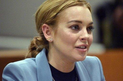 Lindsay Lohan &eacute; detida depois de fugir de acidente de carro em NY
