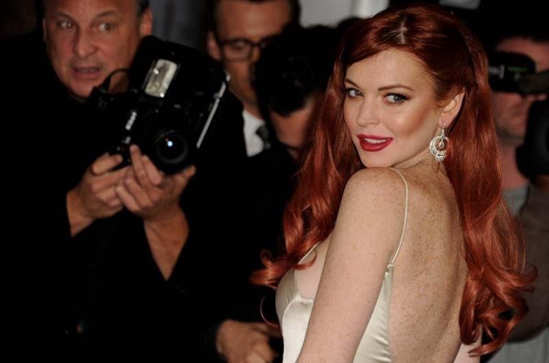 Lindsay Lohan briga em boate e &eacute; presa novamente