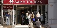 Seguranças fazem vigia em bancos do Chipre enquanto clientes formam filas do lado de fora
