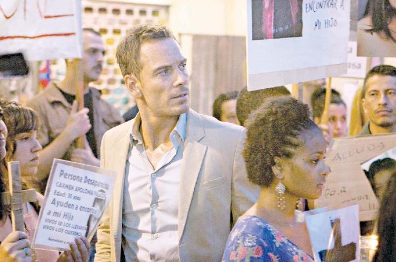 Michael Fassbender &eacute; um advogado envolvivo em neg&oacute;cios ilegais em &acute;O Conselheiro do Crime&acute;