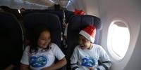 Crianças ganham viagem de avião como presente de Natal