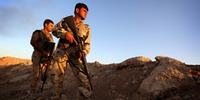 Eles foram escoltados pelas forças curdas depois de ficarem rodeados no monte Sinjar