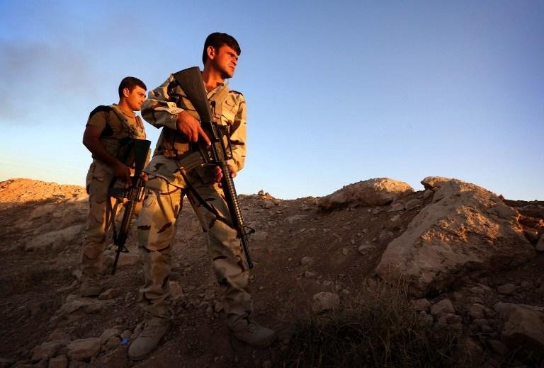 Eles foram escoltados pelas for&ccedil;as curdas depois de ficarem rodeados no monte Sinjar