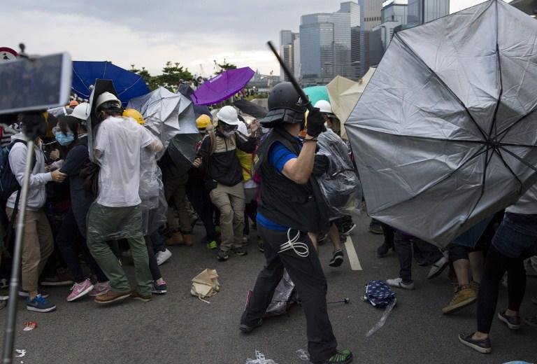Manifestantes reclamam um verdadeiro sufr&aacute;gio universal nesta regi&atilde;o administrativa