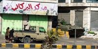  Tanque e guarda-costas ficam de guarda junto à casa do presidente do Iêmen