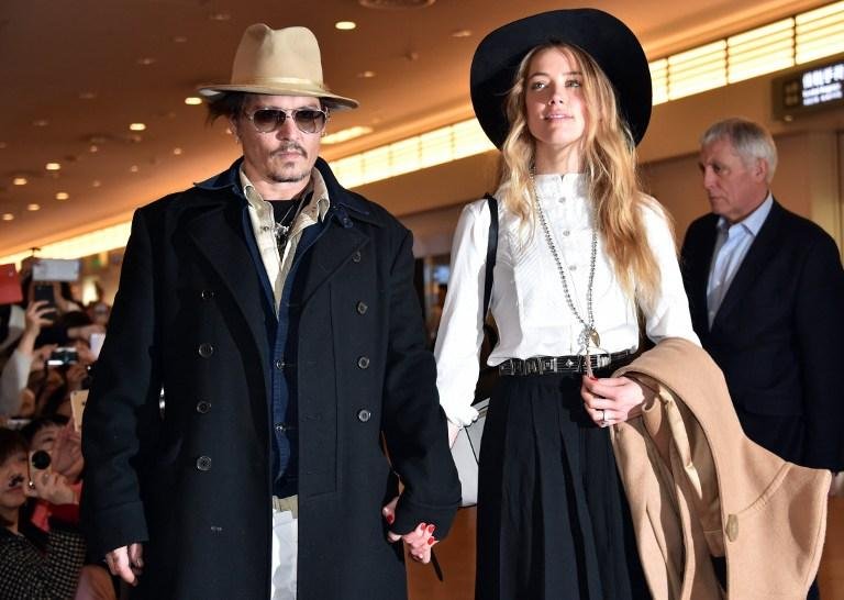 Amber Heard respondeu criticando os membros do governo que viveram 15 minutos de gl&oacute;ria &agrave;s custas do casal 