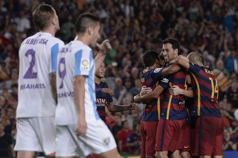 No retorno de Neymar, zagueir&atilde;o belga decide e Bar&ccedil;a vence M&aacute;laga