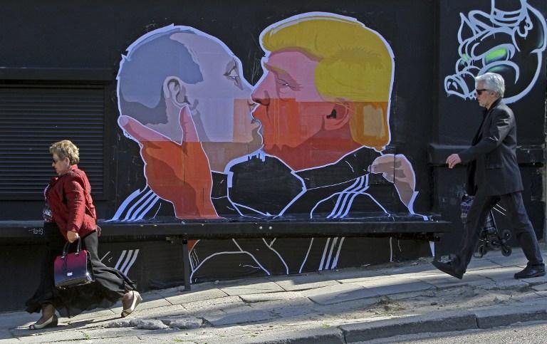 Grafite com beijo de Trump e Putin ilustra temor dos lituanos