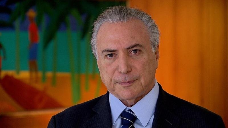Presidente em exerc&iacute;cio gravou um v&iacute;deo para tranquilizar turistas e atletas 