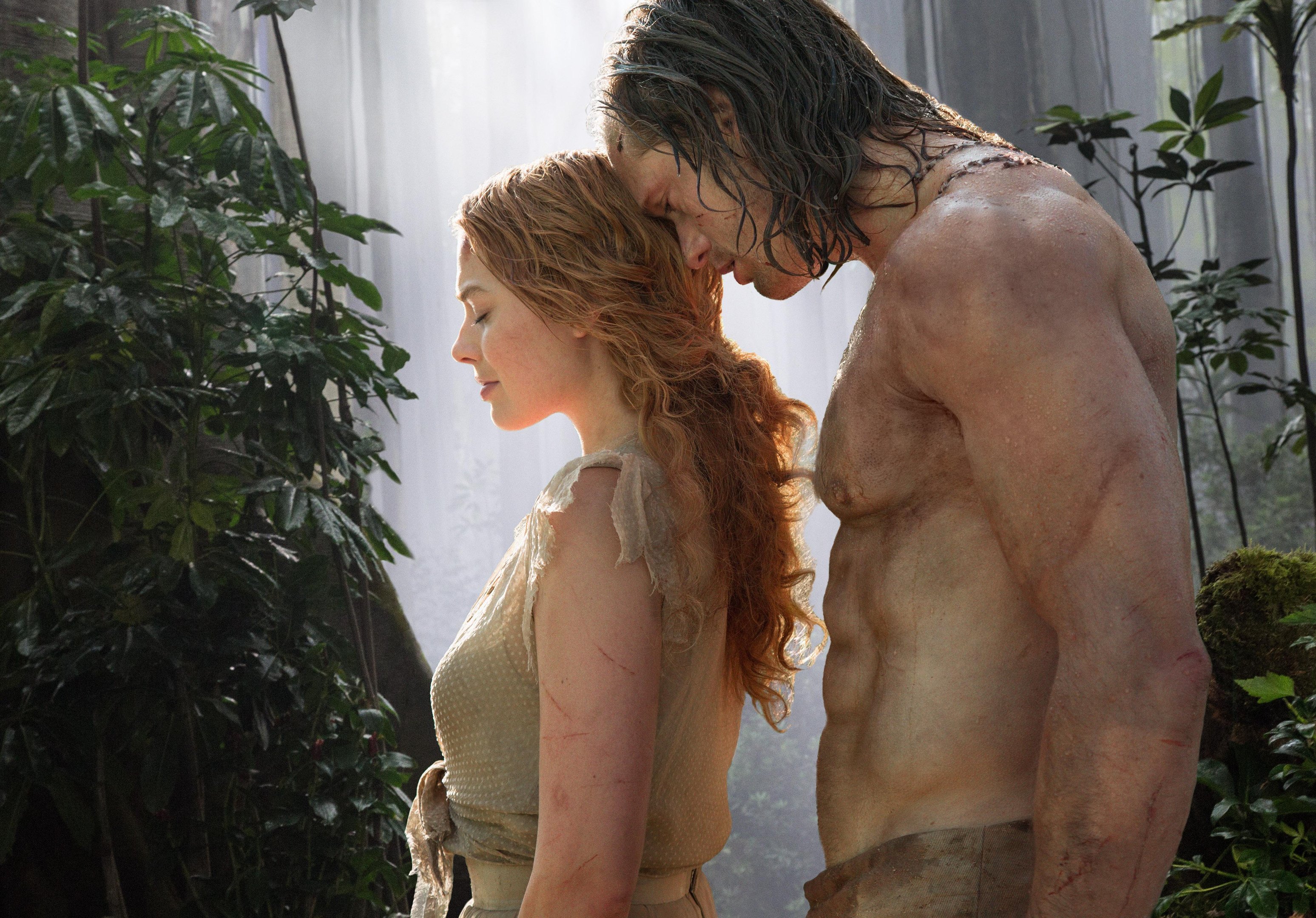 Margot Robbie e Alexander Skarsg&aring;rd como Jane e Tarzan