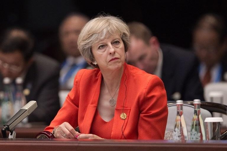 May insistiu que n&atilde;o iniciar&aacute; o processo de div&oacute;rcio com a UE antes do fim do ano