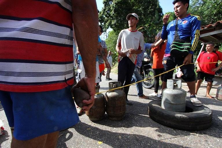 Escassez de notas provoca protestos e saques na Venezuela