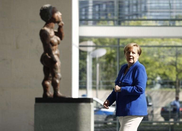 Trump e Merkel trocam cr&iacute;ticas dias depois da C&uacute;pula do G7