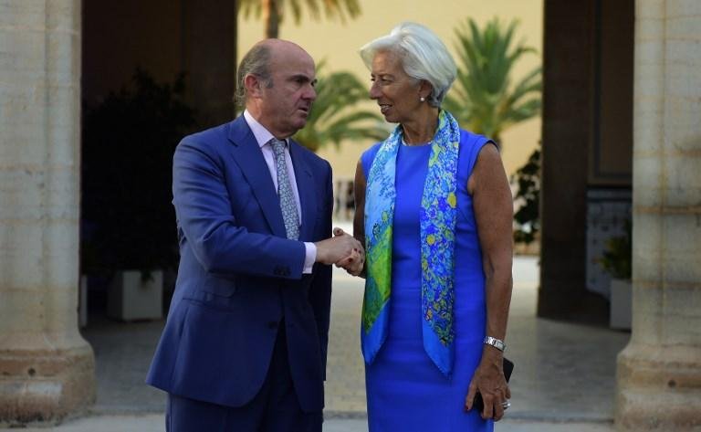 Christine Lagarde ao lado do ministro da economia da Espanha