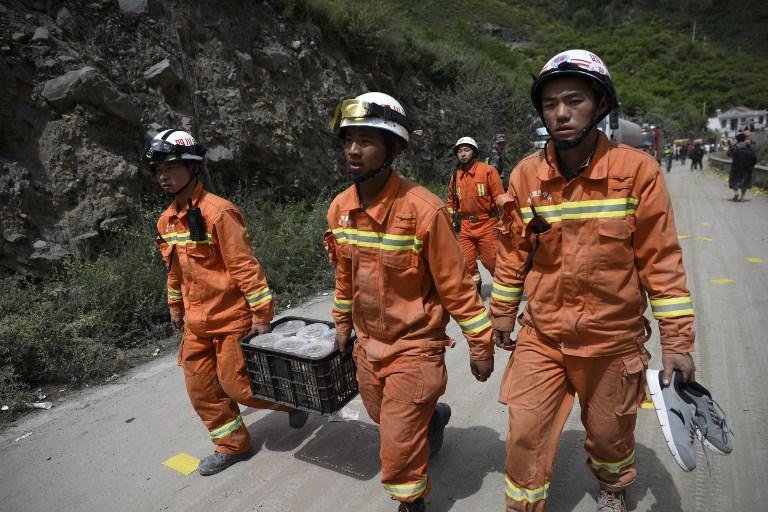 China procura desaparecidos ap&oacute;s deslizamento de terra que deixou 10 mortos 