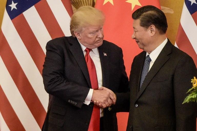 Trump denuncia abusos do com&eacute;rcio mundial e Xi pede globaliza&ccedil;&atilde;o mais aberta