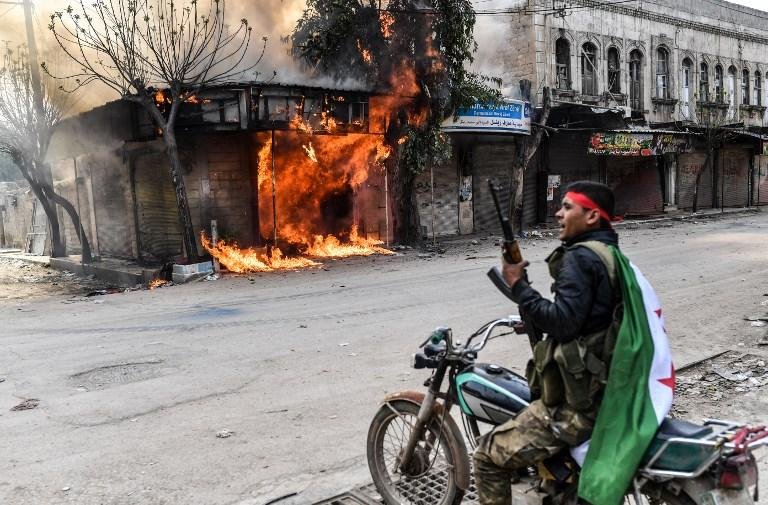 For&ccedil;as turcas e aliados assumem controle de cidade s&iacute;ria de Afrin