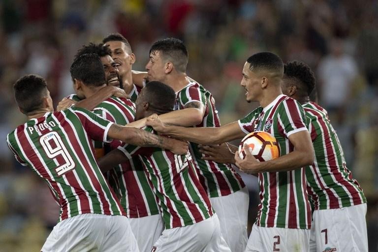 Fluminense arranca no final, faz 3 a 0 no Nacional Potos&iacute; e encaminha vaga