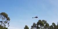 Helicóptero auxilia nas buscas pelos criminosos que mataram policial civil