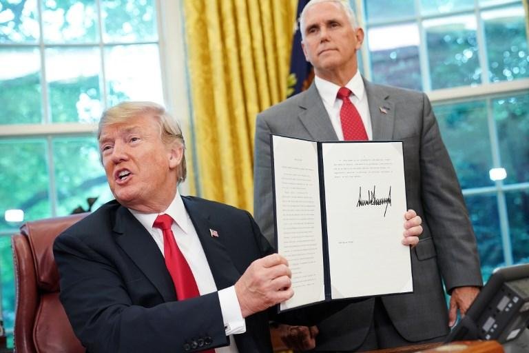Trump assina decreto para p&ocirc;r fim a separa&ccedil;&otilde;es de fam&iacute;lias na fronteira 