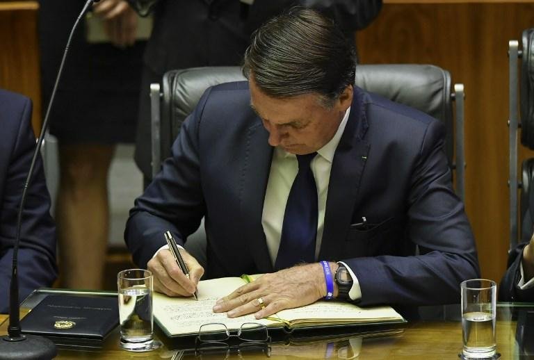 Bolsonaro assinou o termo de posse em cerim&ocirc;nia no Congresso Nacional