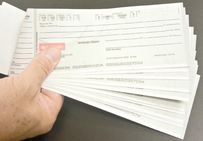 Projeto com mudan&ccedil;a no pagamento via cheque &eacute; vetado por Bolsonaro