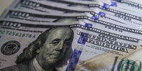 Moeda norte-americana encerra sessão cotada a R$ 4,97