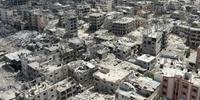 Captura de vídeo mostra uma vista aérea dos edifícios destruídos em Khan Yunis, no sul da Faixa de Gaza, em 22 de abril de 2024
