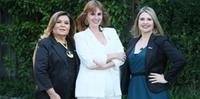 Lessandra Fraga (C), coordenadora do Trocas Inteligentes, está ao lado de Marinelsa Geyer e Michele Zavadil  Pereira