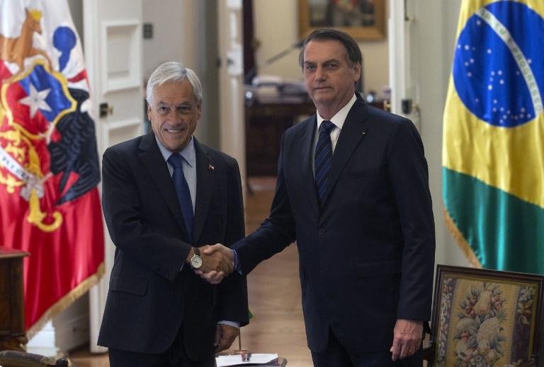 Jair Bolsonaro e Sebasti&aacute;n Pi&ntilde;era no encontro bilateral no Pal&aacute;cio de La Moneda