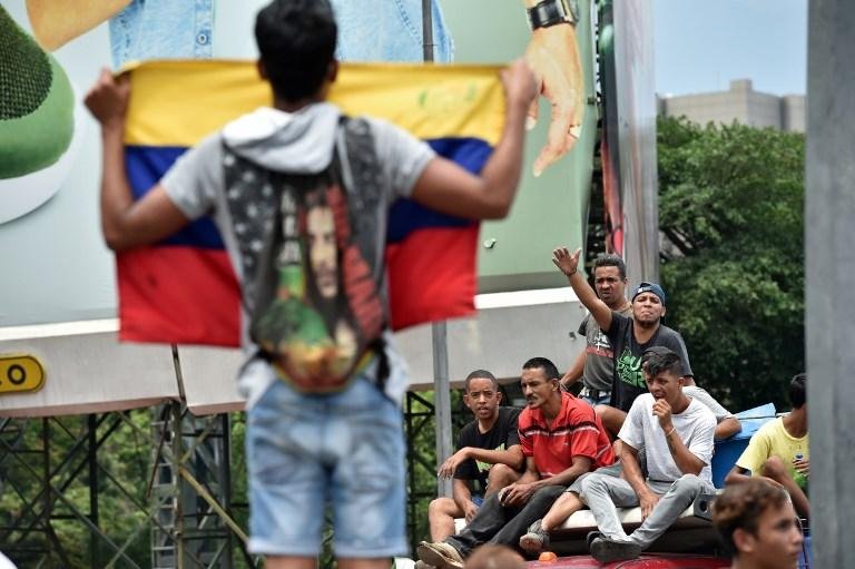 Tens&atilde;o aumenta com os protestos convocados pelo governo de Maduro e pela oposi&ccedil;&atilde;o liderada por Guaid&oacute;