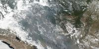 Imagem de satélite divulgada hoje pela Nasa mostra focos de incêndio na Amazônia em diversos Estados brasileiros